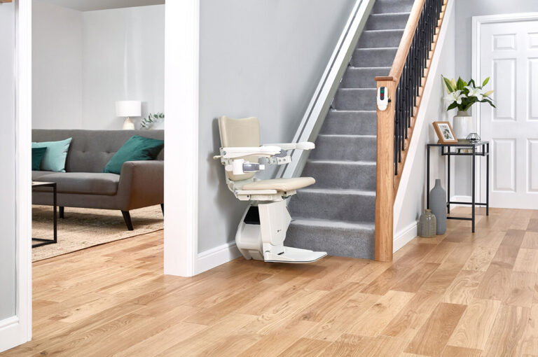 A stairlift at the bottom of the stairs